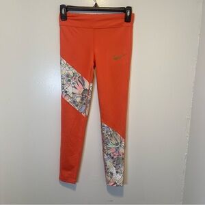 Nike Orange Leggings with Green Logo and Floral Panels‎ girls size medium